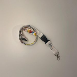 Schlüsselband mit satirischen Medikamentenklebchen